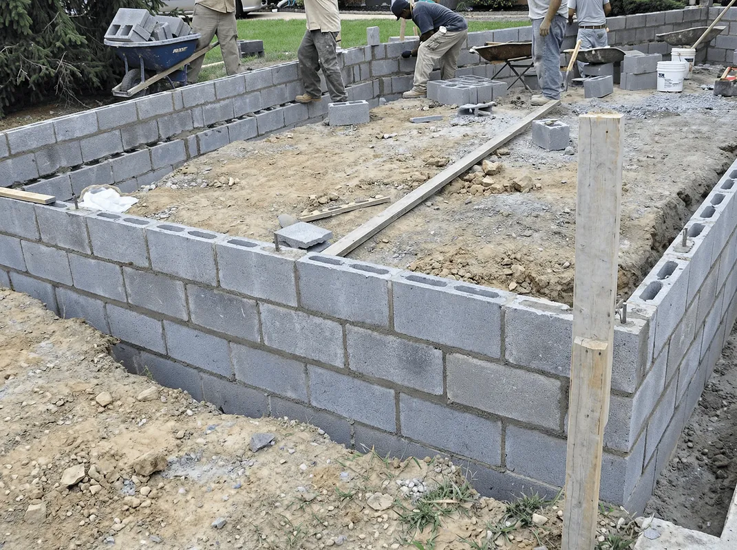 Professionals building a foundation with blocks in Sioux Falls, SD